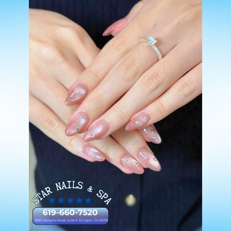 Shellac manicure with shiny finish at nail salon 92019